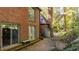 Brick patio adjacent to the house, surrounded by greenery at 906 Marlowe Rd, Raleigh, NC 27609