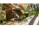 Side entrance with a green door and brick steps at 906 Marlowe Rd, Raleigh, NC 27609