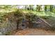 Stone water feature with a leafy backdrop at 906 Marlowe Rd, Raleigh, NC 27609