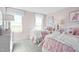 Charming bedroom with twin beds and bright decor at 1004 Country Pasture Cv, Wendell, NC 27591