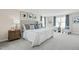 Spacious main bedroom with a large bed and sitting area at 1004 Country Pasture Cv, Wendell, NC 27591
