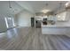 Modern kitchen with white cabinets and a large island at 115 Hunterwood Pl, Benson, NC 27504