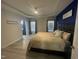 Spacious main bedroom with LVP flooring and en-suite bathroom at 115 Hunterwood Pl, Benson, NC 27504