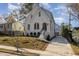 Modern two-story house with gray siding and a driveway at 1409 Sedgefield St, Durham, NC 27705