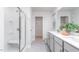 Clean bathroom, double vanity, and a large walk-in shower at 1823 Hinesley Dr, Durham, NC 27703