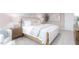 Bright bedroom with a queen-size bed and wood nightstands at 1823 Hinesley Dr, Durham, NC 27703
