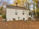 Side view of house with basement entrance at 307 Bickett Blvd, Raleigh, NC 27608