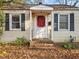 House with red front door and autumn leaves at 307 Bickett Blvd, Raleigh, NC 27608