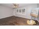 Living room featuring hardwood floors and large windows at 308 Santee Rd, Durham, NC 27704