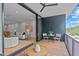 Outdoor balcony space with seating area and partial view of the city skyline at 511 S Bloodworth St # 103, Raleigh, NC 27601