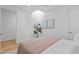 Bedroom with light walls, a skylight, and a neutral color scheme at 511 S Bloodworth St # 103, Raleigh, NC 27601
