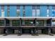 Contemporary townhome building with attached garages and balconies at 511 S Bloodworth St # 103, Raleigh, NC 27601