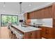 Modern kitchen with large island and stainless steel appliances at 511 S Bloodworth St # 103, Raleigh, NC 27601