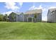 House with backyard and grassy lawn at 516 Lemon Daisy Ln, Knightdale, NC 27545