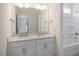 Double sink bathroom with a bathtub and shower at 516 Lemon Daisy Ln, Knightdale, NC 27545