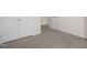 Bright bedroom with carpet flooring and double doors at 516 Lemon Daisy Ln, Knightdale, NC 27545