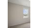 Simple bedroom with carpet flooring and a window at 516 Lemon Daisy Ln, Knightdale, NC 27545