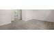 Carpeted hallway with doors to other rooms at 516 Lemon Daisy Ln, Knightdale, NC 27545