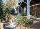 Brick steps lead from the home to the backyard and lower level at 10 Whitburn Pl, Durham, NC 27705