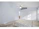 Main bedroom with vaulted ceiling, ceiling fan and access to bathroom at 1116 Pilton Pl, Raleigh, NC 27604