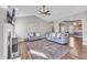 Living room with hardwood floors, fireplace, and large windows at 141 N Sunset Ridge Dr, Willow Springs, NC 27592