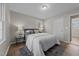 Well-lit bedroom with wood flooring and ample closet space at 16 Gail St, Pittsboro, NC 27312