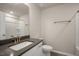 Bathroom with a single vanity, toilet, and shower/tub combo at 1817 Hinesley Drive, Durham, NC 27703