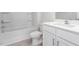 Clean bathroom with tub, toilet and vanity at 1819 Hinesley Dr, Durham, NC 27703