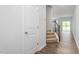 Modern staircase with metal railing leading to the second floor at 1819 Hinesley Dr, Durham, NC 27703