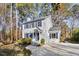 Two-story house with blue shutters, stone accents, and a landscaped lawn at 19 Briarfield Ct, Durham, NC 27713