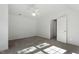 Bright bedroom with ceiling fan and carpet at 304 Pebble Springs Rd, Chapel Hill, NC 27514