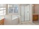 Bathroom with corner soaking tub and shower at 3100 Lariat Ridge Dr, Wake Forest, NC 27587