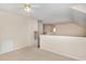 Upstairs bedroom with ceiling fan and access to loft at 3100 Lariat Ridge Dr, Wake Forest, NC 27587