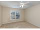 Well-lit bedroom featuring a ceiling fan and large window with blinds at 3100 Lariat Ridge Dr, Wake Forest, NC 27587