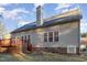 Rear view of house with deck and landscaped yard at 3100 Lariat Ridge Dr, Wake Forest, NC 27587
