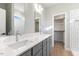Bathroom with double vanity and walk-in shower at 408 Cherry St, Fuquay Varina, NC 27526