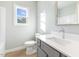 Clean bathroom with single vanity and bathtub at 408 Cherry St, Fuquay Varina, NC 27526