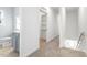 Bathroom with grey vanity and walk in closet at 408 Cherry St, Fuquay Varina, NC 27526
