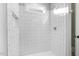 Bright bathroom with a shower and subway tile at 408 Cherry St, Fuquay Varina, NC 27526