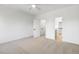 Bedroom with carpet, ceiling fan and walk-in closet at 408 Cherry St, Fuquay Varina, NC 27526