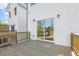 Deck with sliding glass door access to the home and a view of the backyard at 408 Cherry St, Fuquay Varina, NC 27526