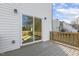 Home exterior showcasing a deck with sliding glass doors and a view of the neighborhood at 408 Cherry St, Fuquay Varina, NC 27526