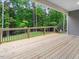 Spacious back deck with wooded views at 652 Shawnee Dr, Louisburg, NC 27549