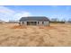 New construction home with a large backyard and patio at 652 Shawnee Dr, Louisburg, NC 27549