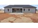 Newly built home with covered patio and large backyard at 652 Shawnee Dr, Louisburg, NC 27549