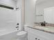 Bathroom with granite countertop and tub at 652 Shawnee Dr, Louisburg, NC 27549