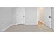 Spacious bedroom with carpeted floors and neutral walls at 652 Shawnee Dr, Louisburg, NC 27549