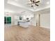 Open concept kitchen with white cabinets, granite counters, and island at 652 Shawnee Dr, Louisburg, NC 27549