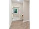 Laundry room with built-in cabinets and marble-look tile floors at 652 Shawnee Dr, Louisburg, NC 27549