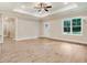 Open living room with hardwood floors and neutral walls at 652 Shawnee Dr, Louisburg, NC 27549